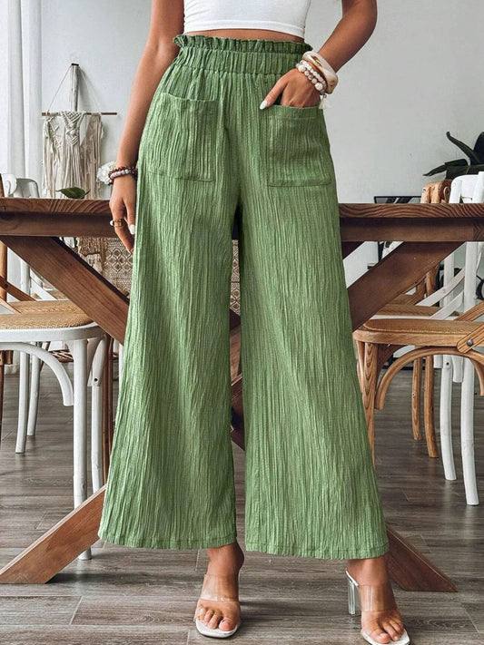 Pantalones anchos con cintura elástica y bolsillos